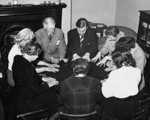 a group of CIA psychics at a round table