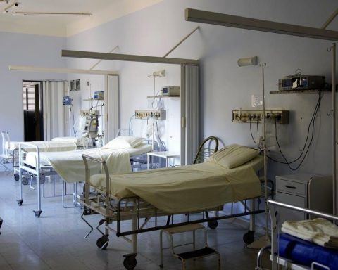 Patient beds with medical equipment in a hospital